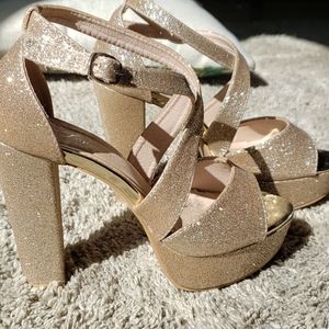 Gold sparkly heels